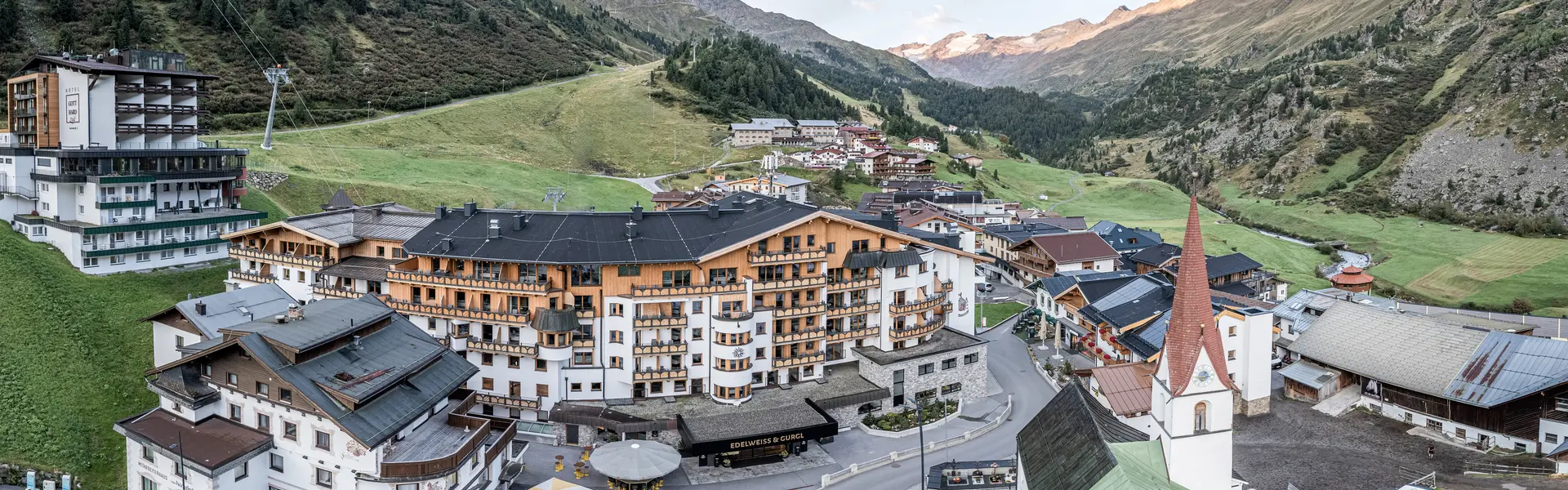 Exterior view from the Edelweiss & Gurgl in summer